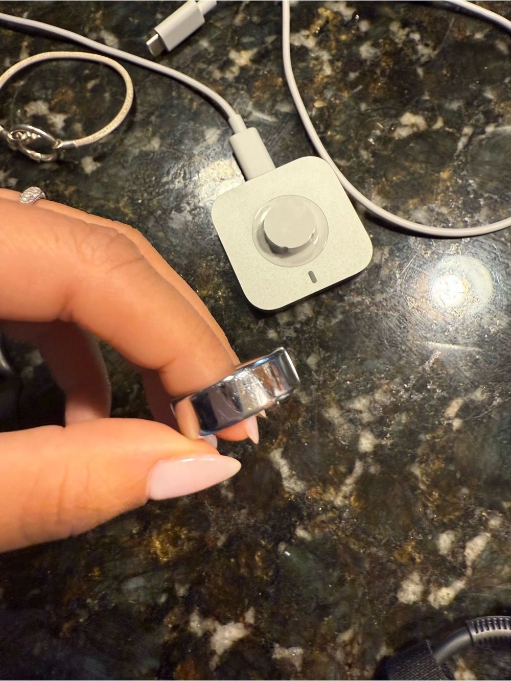 Aura Silver Smart Ring and Charging Dock